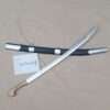 cossack shashka and scabbard displayed at beige color surface